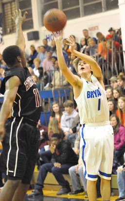 Bryant's Tyler Simmons (1) launches a 3 over Benton's Rickey Gipson. (Photo by Kevin Nagle)