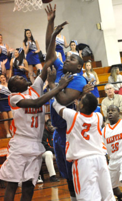 Cameron Murray powers up a shot in a crowd. (Photo by Kevin Nagle)