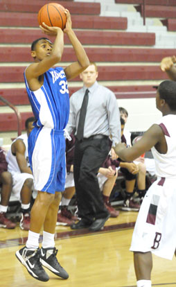 Romen Martin rises up for a jump shot. (photo by Kevin Nagle)