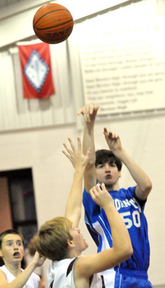 Kyle Sahr fires up a jumper. (Photo by Kevin Nagle)