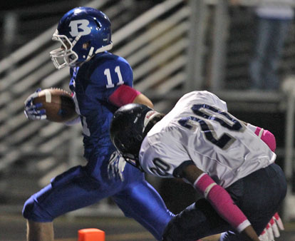 Austin Vail slips past Fair's Bryon Haney for a touchdown. (Photo by Rick Nation)