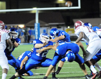 Alex Denker's first high school varsity field goal was good from 39 yards out. (Photo by Kevin Nagle)