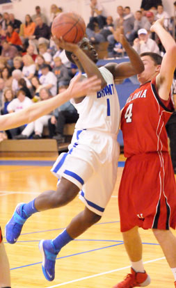 Greyson Giles (1) shoots over Vilonia's Cameron Wilkins. (Photo by Kevin Nagle)