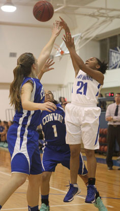 Destiny Martin shoots over a Conway White defender. (Photo by Rick Nation)