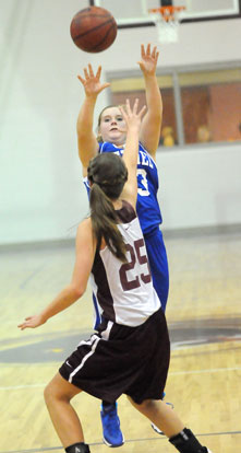 Stephanie Cullen fires a shot over a Benton defender. (Photo by Kevin Nagle)