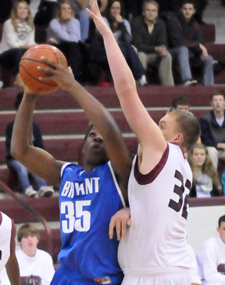 John Winston (35) looks to get a shot over Benton's Westin Riddick. (Photo by Kevin Nagle)