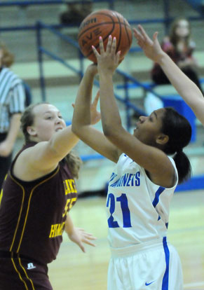 Destiny Martin (21) led all scorers with 10 points in Monday night's game. (Photo by Kevin Nagle)