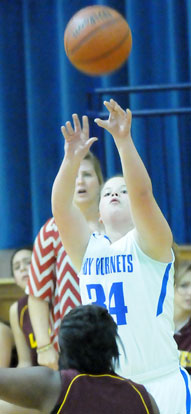Reagan McCormick fires up a jumper. (Photo by Kevin Nagle)