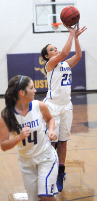 Peyton Weaver (14) moves to get into position for a rebound as teammate Aubree Allen (23) launches a 3-pointer. (Photo by Kevin Nagle)