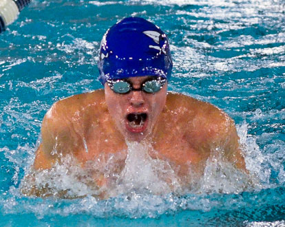 Christian Reep on his way to winning the 100 yard breast stroke. (Photo courtesy of Marianne Shelton)