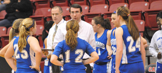 Bryant coaches Lawrence Jefferson, left, and Nathan Castaldi instruct the Lady Hornets during a timeout. (Photo by Kevin Nagle)