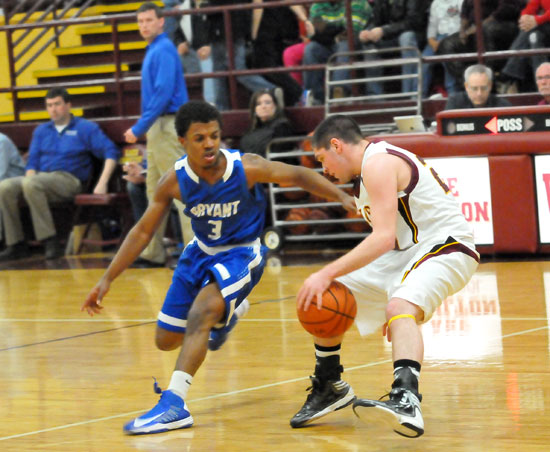 Bryant's C.J. Rainey pressures Lake Hamilton's Cade Hill. (Photo by Kevin Nagle)