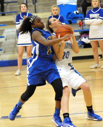 Kailey Nagle is fouled on the way up for a shot. (Photo by Kevin Nagle)