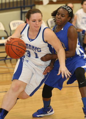 Carolyn Reeves drives past a North Little Rock defender. (Photo by Rick Nation)