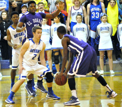 Skyler McKissock (2) and Strodney Davis (11) defend against El Dorado's Jacorey Tate and Curstin Johnson (50). (Photo by Kevin Nagle)