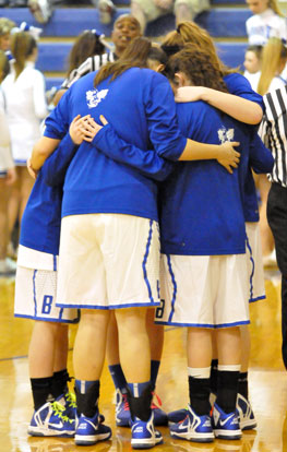 The Bryant seniors huddle before the game. (Photo by Kevin Nagle)