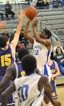Kris Croom (32) takes a jumper. (Photo by Kevin Nagle)