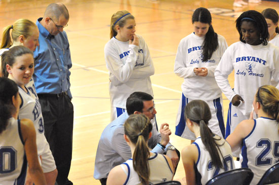 Bryant Lady Hornets freshman coach Nathan Castaldi instructs his team during a timeout. (Photo by Kevin Nagle)