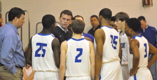 Bryant coach Mike Abrahamson instructs his team during a timeout. (Photo by Kevin Nagle)