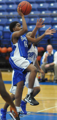 Quenton Nimmer takes it to the rack. (Photo by Kevin Nagle)