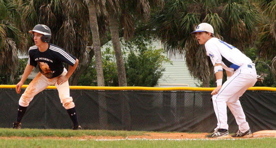 Bryant's Jason Hastings holds a St. Mark's base-runner at first. (Photo courtesy of J'Ann Boyd Lessenberry)