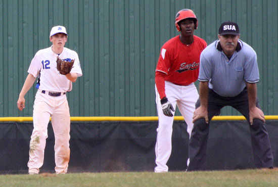 Bryant shortstop Trevor Ezell (12) holds a runner at second. (Photo by J'Ann Boyd Lessenberry)