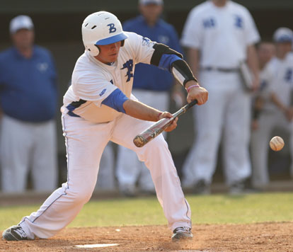 Hayden Lessenberry gets a bunt down. (Photo by Rick Nation)