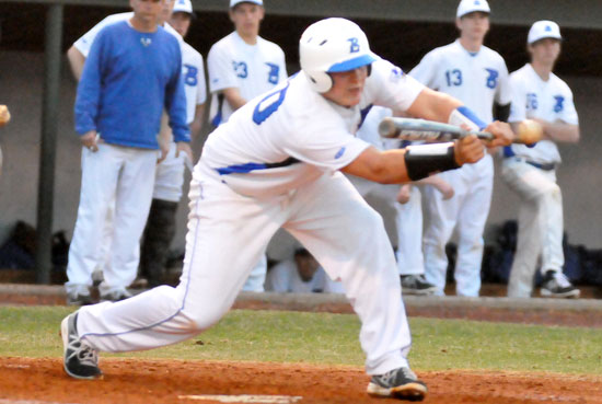 Bryant's Blain Jackson gets one of his two sacrifice bunts down. (Photo by Kevin Nagle)
