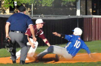 Bryant's Hayden Lessenberry (10) slides safely into third on a sixth-inning single by Hayden Daniel as Benton third baseman Greyson Chilton takes the throw. (Photo by Kevin Nagle)