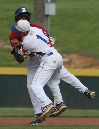 Bryant second baseman Korey Thompson (1) collides with Pine Bluff base-runner Adam Graham as he's tagged out on a pick-off play in the third inning. (Photo by Rick Nation)