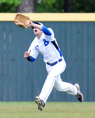 Left fielder Austin Caldwell tracks down a shallow fly. (Photo by Kevin Nagle)