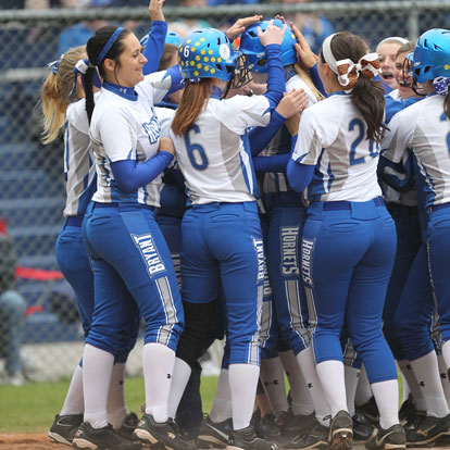 Julie Ward is congratulated after her home run. (Photo by Rick Nation)