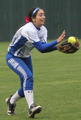 Carly Yazza makes a catch in left field. (Photo by Rick Nation)