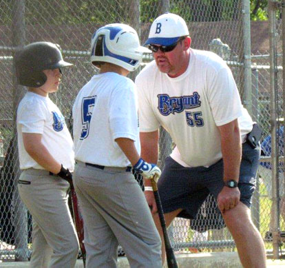 Coach Bryan Hall talks with Hunter Stallman and Austin Cook during Saturday's action in Conway. (Photo courtesy of Lara James)