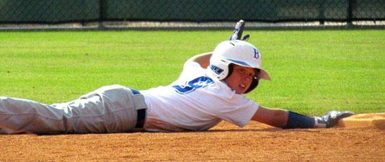 Tyler Jordan asks for time after diving back into second base. (Photo courtesy of Lara James)