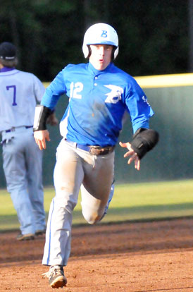 Trevor Ezell sprints towards third on his sixth-hitting triple. (PHoto by Kevin Nagle)