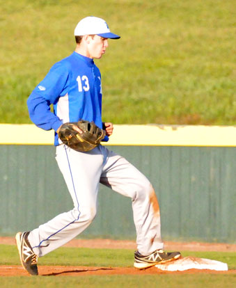 Ty Harris steps on first for the final out of Friday's game. (Photo by Kevin Nagle)