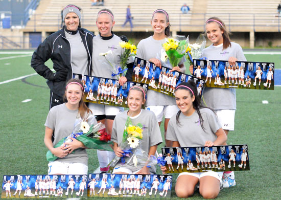 Head coach Julie Long, back left, with seniors, front from left, Morgan Hawkins, Shelby Gartrell, Lexie Balisterri; back row, Kaitlin Gaiser, Bailey Gartrell and Katie Barrington. (Photo by Kevin Nagle)