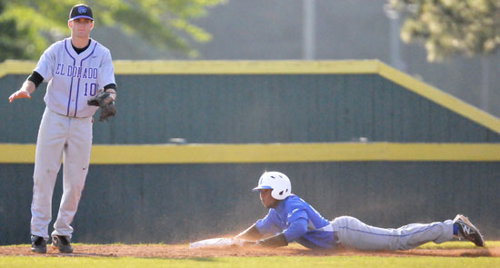 Marcus Wilson slides into third with a stolen base as El Dorado third baseman Matthew Lansdell awaits a throw that never came. (Photo by Kevin Nagle)