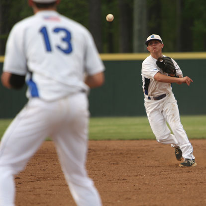 Second baseman Korey Thompson fired to Ty Harris at first.