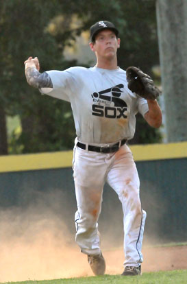 Brandan Warner fires to first after making a play at third. (Photo by Kevin Nagle)