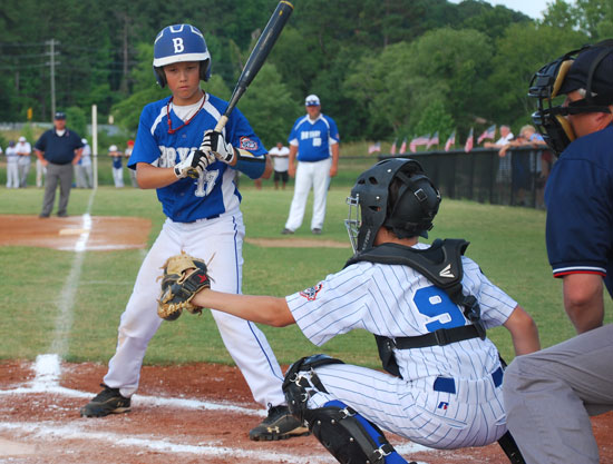 Logan Chambers watches a pitch hit the catcher's mitt during a plate appearance in Sunday's game. (Photo courtesy of Crissy McEntire)