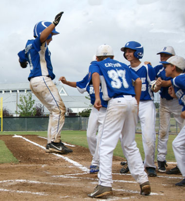 Ryan Lessenberry completes his tour around the bases after his home run in the final game of the Cal Ripken Regional Tournament Tuesday morning. (Photo courtesy of Diane Dupree)