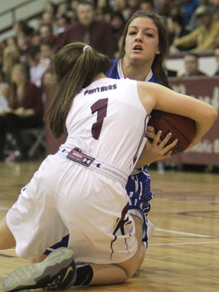 Bryant's Maddie Baxter and Benton's Bella Slaughter (1) go to the floor to try to secure the ball. (Photo by Rick Nation)