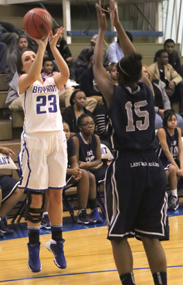 Aubree Allen fires a jumper over J.A. Fair's Kimora Turner. (Photo by Rick Nation)