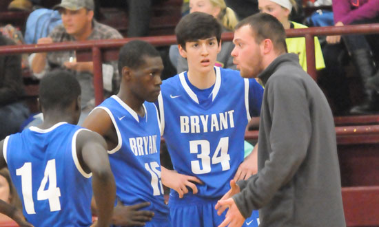 Bryant freshman coach Tyler Posey talks to Caylin Allen (14), Kaleb Turner (15) and Kyle Sahr (34) during a timeout in Monday's game. (Photo by Kevin Nagle)