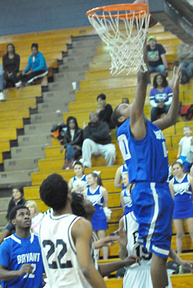 Rickey Buchanan hits a layup. (Photo by Kevin Nagle)