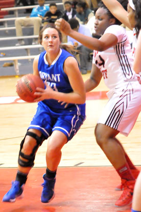 Aubree Allen makes a move towards the hoop. (Photo by Kevin Nagle)