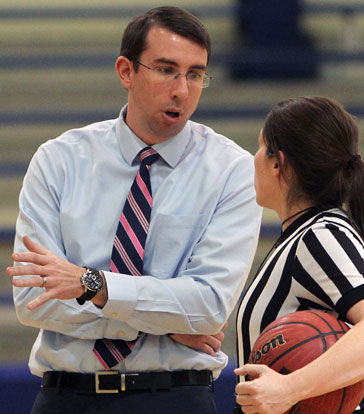 Coach Nathan Castaldi discusses a call with one of the officials during Thursday's game. (Photo by Rick Nation)