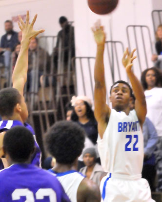 Romen Martin fires up a 3-pointer. (Photo by Kevin Nagle)